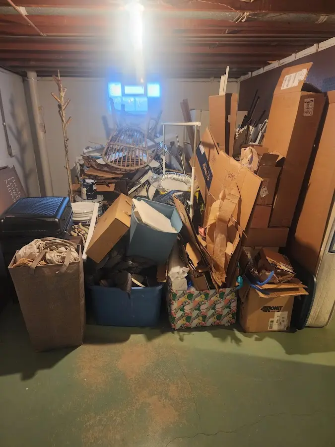 Roll-off dumpster container at job site for Yard Waste Dumpster Rental in Beckley